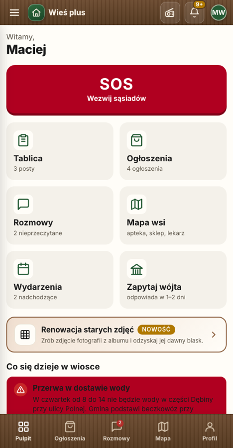 Ekran główny aplikacji Wieś plus z przyciskiem SOS i kafelkami funkcji